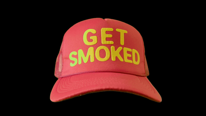 Front of red GET SMOKED anime trucker hat with yellow 3D puff lettering