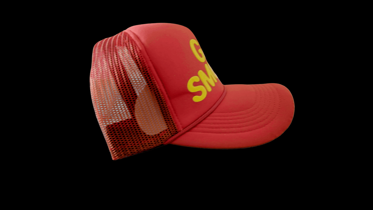 Side view of red GET SMOKED anime trucker hat with mesh back